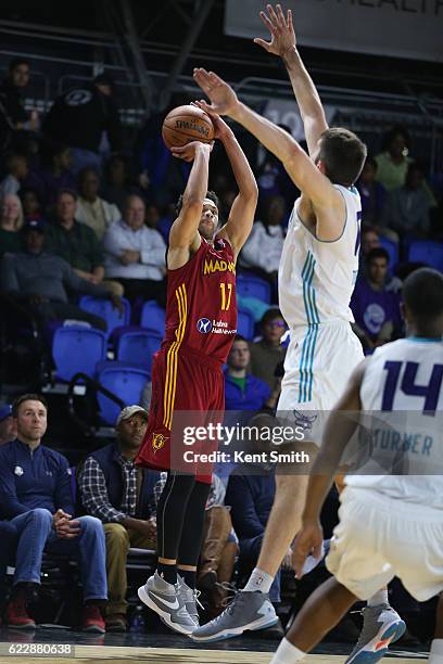 Trey Mckinney-Jones of the Fort Wayne Mad Ants shoots the ball against the Greensboro Swarm during the game at the The Field House at the Greensboro...
