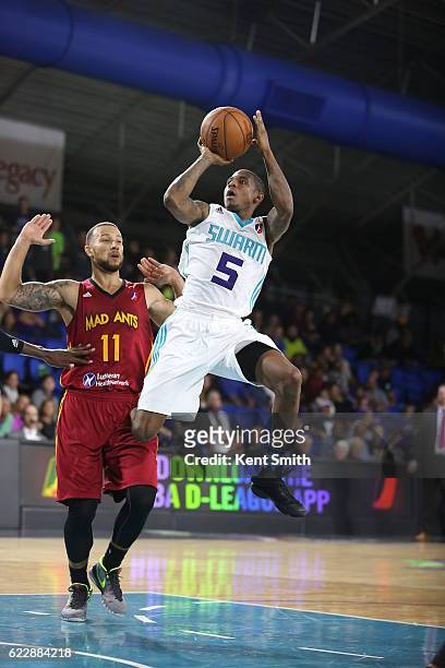 Xavier Munford of the Greensboro Swarm shoots against Trey Mckinney-Jones of the Fort Wayne Mad Ants during the game at the The Field House at the...