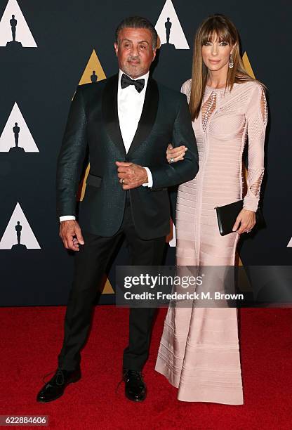 Actor Sylvester Stallone and model Jennifer Flavin attend the Academy of Motion Picture Arts and Sciences' 8th annual Governors Awards at The Ray...