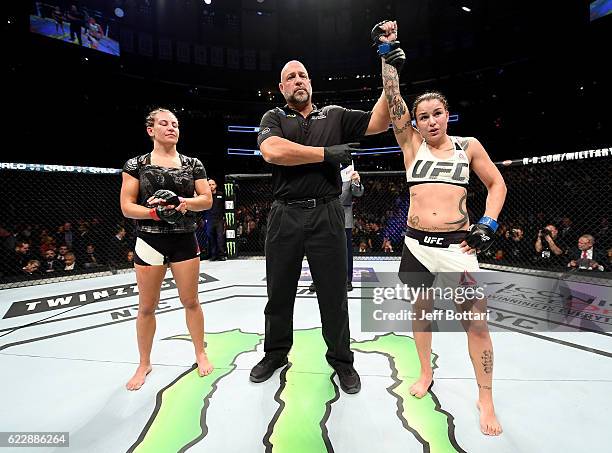 Raquel Pennington of the United States is awarded a unanimous decision victory over Miesha Tate of the United States in their women's bantamweight...