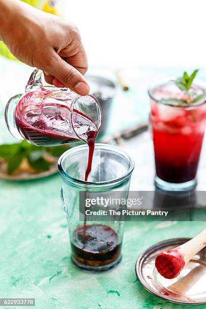 mixed berries spritzer - spritzer stock pictures, royalty-free photos & images