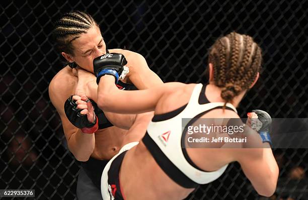 Karolina Kowalkiewicz of Poland fights against Joanna Jedrzejczyk of Poland in their women's strawweight championship bout during the UFC 205 event...