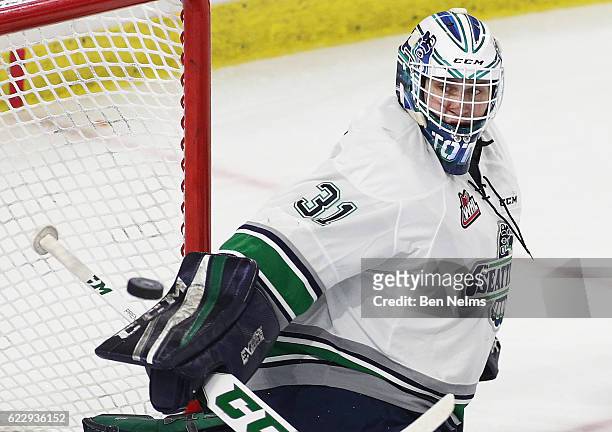 Goaltender Rylan Toth of the Seattle Thunderbirds makes a save against the Vancouver Giants during the second period of their WHL game at the Langley...