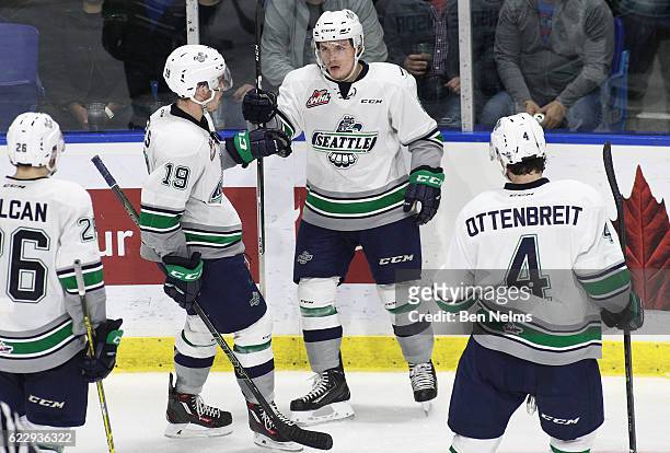 Scott Eansor of the Seattle Thunderbirds celebrates his goal against the Vancouver Giants with teammate Donovan Neuls during the third period of...