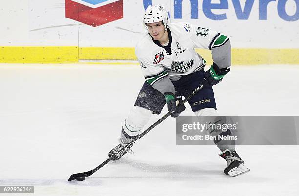 Mathew Barzal of the Seattle Thunderbirds plays the puck against the Vancouver Giants during the third period of their WHL game at the Langley Events...