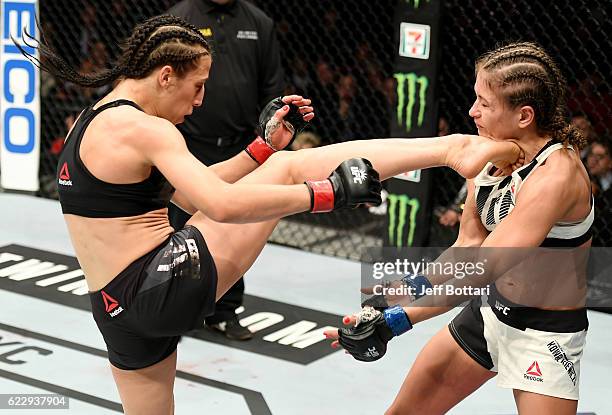 Karolina Kowalkiewicz of Poland fights against Joanna Jedrzejczyk of Poland in their women's strawweight championship bout during the UFC 205 event...