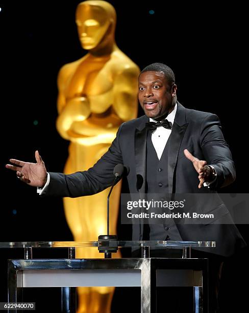 Actor Chris Tucker presents an award onstage during the Academy of Motion Picture Arts and Sciences' 8th annual Governors Awards at The Ray Dolby...