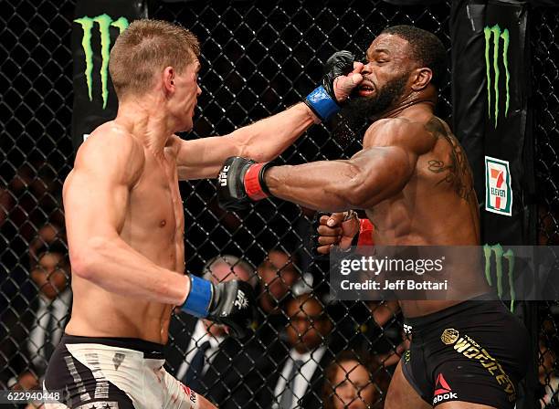 Tyron Woodley of the United States fights against Stephen Thompson of the United States in their welterweight championship bout during the UFC 205...