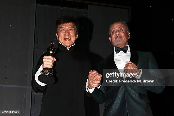 Honoree Jackie Chan poses with actor Sylvester Stallone during the Academy of Motion Picture Arts and Sciences' 8th annual Governors Awards at The...
