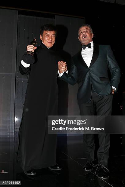 Honoree Jackie Chan poses with actor Sylvester Stallone during the Academy of Motion Picture Arts and Sciences' 8th annual Governors Awards at The...