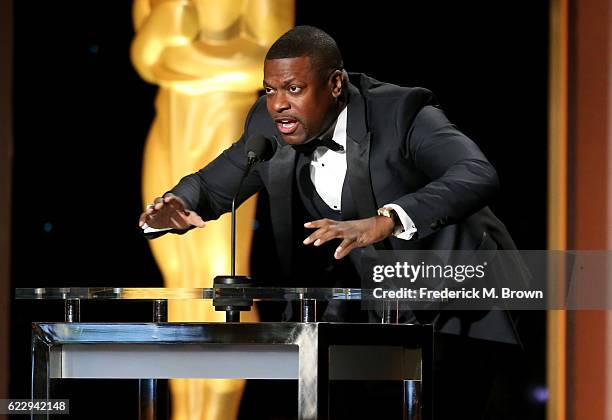 Actor Chris Tucker presents an award onstage during the Academy of Motion Picture Arts and Sciences' 8th annual Governors Awards at The Ray Dolby...