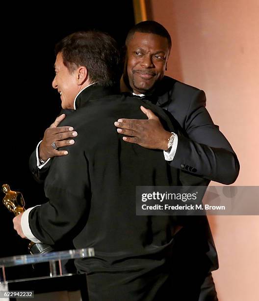 Actor Chris Tucker presents an award onstage to honoree Jackie Chan during the Academy of Motion Picture Arts and Sciences' 8th annual Governors...