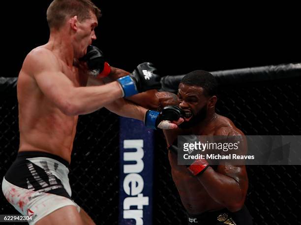 Tyron Woodley of the United States fights against Stephen Thompson of the United States in their welterweight championship bout during the UFC 205...
