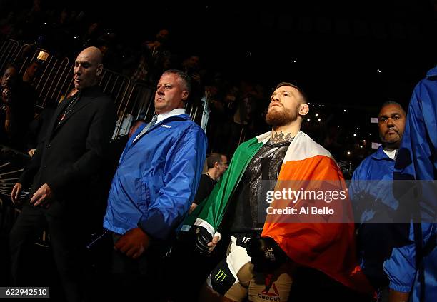 Conor McGregor of Ireland heads to the octagon for his fight against Eddie Alvarez of the United States in their lightweight championship bout during...