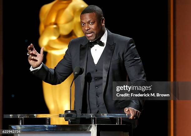 Actor Chris Tucker presents an award onstage during the Academy of Motion Picture Arts and Sciences' 8th annual Governors Awards at The Ray Dolby...