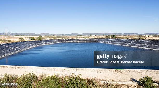 raft of irrigation for the agriculture of fruit-bearing trees - billabong water stock pictures, royalty-free photos & images