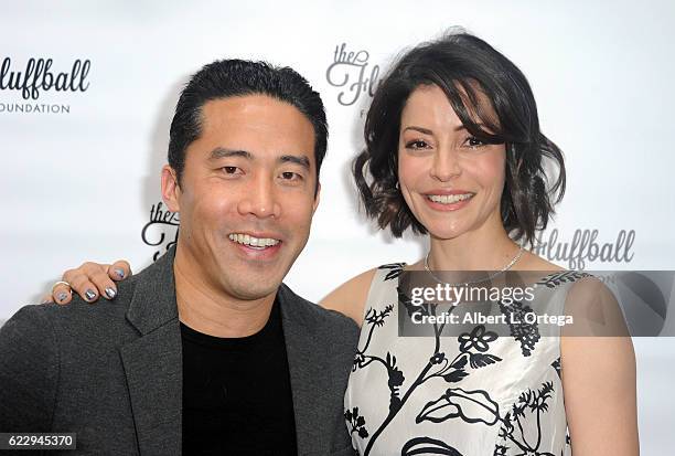 Marc Ching and actress Emmanuelle Vaugier at the 2016 Fluffball Event held at The Little Door on November 12, 2016 in Los Angeles, California.