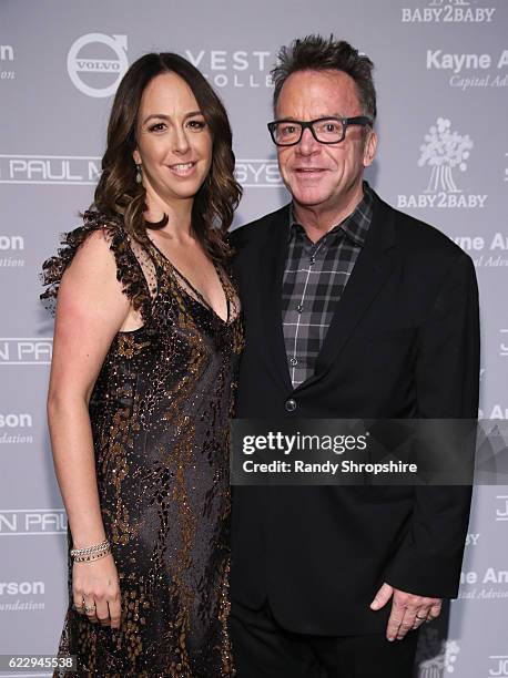 Ashley Groussman and actor Tom Arnold attend the Fifth Annual Baby2Baby Gala, Presented By John Paul Mitchell Systems at 3LABS on November 12, 2016...