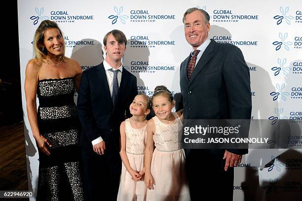 Actor and Global Down Syndrome Foundation spokesperson John C. McGinley poses for pictures with his wife Nichole Kessler, son Max, and daughters Kate...