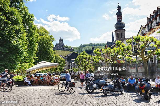 cityscape of cochem at moselle river in summer. - cochem moselle stock pictures, royalty-free photos & images