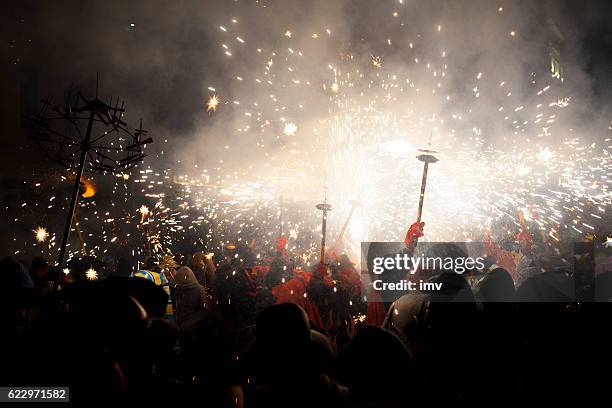 correfoc - spain traditional party in mediterranean area - correfoc stock pictures, royalty-free photos & images