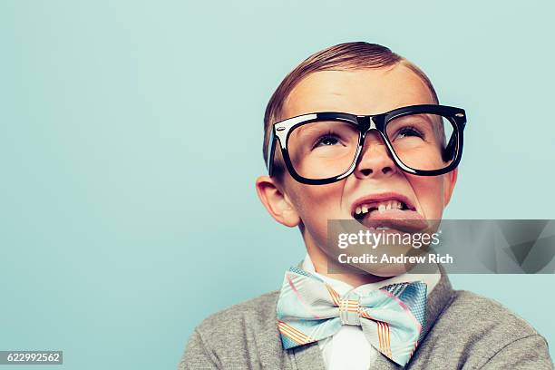 young nerd boy makes face - looking up vintage stock pictures, royalty-free photos & images