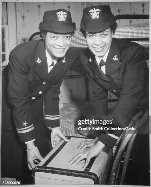 Final members of the final graduating class at the Naval Reserve Midshipmen's school wearing uniforms in Northampton, Massachusetts, December 21,...