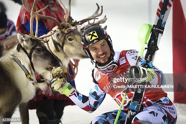 Winner Marcel Hirscher of Austria poses with his trophy, a reindeer which Hirscher named Leo, after the Men's FIS Alpine Skiing World Cup slalom race...