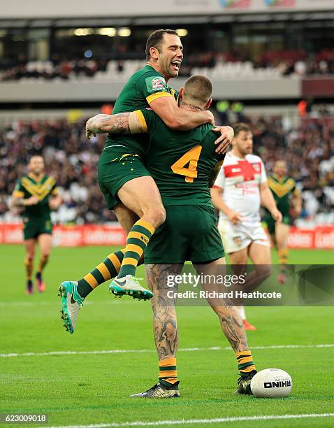 Josh Dugan of Australia dives over to score a try during the Four Nations match between the England and Australian Kangaroos at Olympic Stadium on...