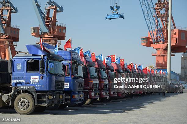 Chinese trucks carrying first trade goods are pictured parked at the Gwadar port, some 700 kms west of Karachi on November 13, 2016. Pakistan's Prime...