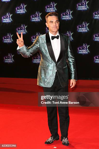 Robbie Williams arrives at the 18th NRJ Music Awards at the Palais des Festivals on November 12, 2016 in Cannes, France.