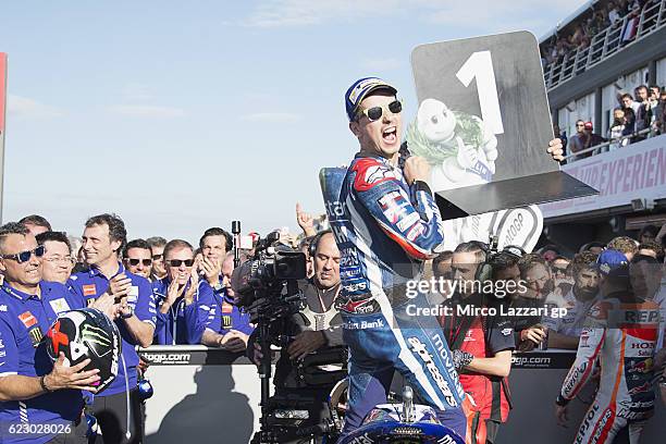 Jorge Lorenzo of Spain and Movistar Yamaha MotoGP celebrates the victory under the podium at the end of the MotoGP race during the MotoGP of Valencia...