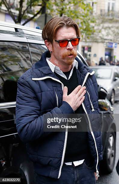 Singer Jesse Hughes of US rock group Eagles of Death Metal leaves near the Bataclan concert hall after a ceremony to mark the first anniversary of...