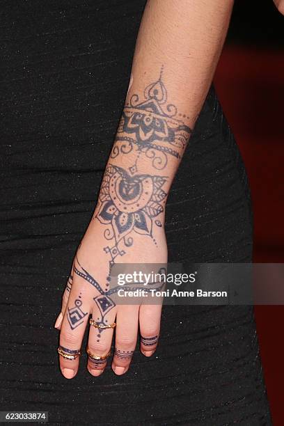 Members of band L.E.J Juliette Saumagne,Elisa Paris and Lucie Lebrun arrive at the 18th NRJ Music Awards at the Palais des Festivals on November 12,...