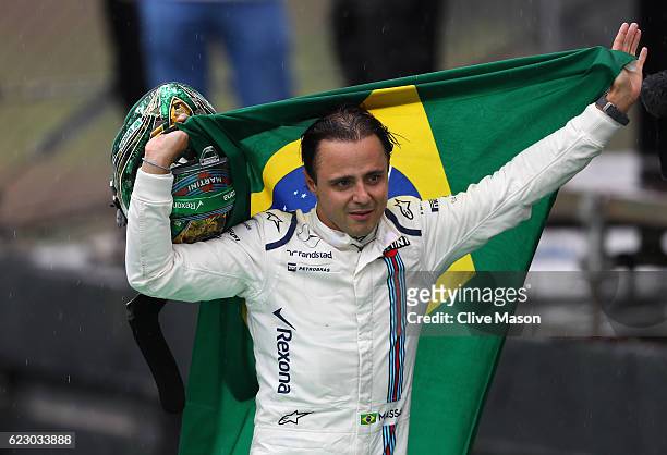 Felipe Massa of Brazil and Williams waves farewell to the Brazilian crowd during the Formula One Grand Prix of Brazil at Autodromo Jose Carlos Pace...