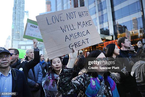 Thousands of anti-Donald Trump protesters, including many pro-immigrant groups, hold a demonstration outside of a Trump property as New Yorkers react...