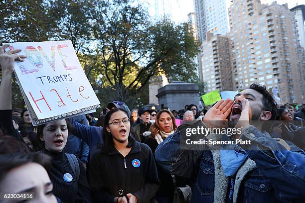 Thousands of anti-Donald Trump protesters, including many pro-immigrant groups, hold a demonstration outside of a Trump property as New Yorkers react...