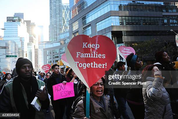 Thousands of anti-Donald Trump protesters, including many pro-immigrant groups, hold a demonstration outside of a Trump property as New Yorkers react...