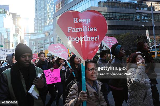 Thousands of anti-Donald Trump protesters, including many pro-immigrant groups, hold a demonstration outside of a Trump property as New Yorkers react...