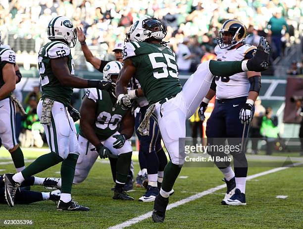 Lorenzo Mauldin of the New York Jets celebrates sacking quarterback Case Keenum of the Los Angeles Rams in the second quarter at MetLife Stadium on...