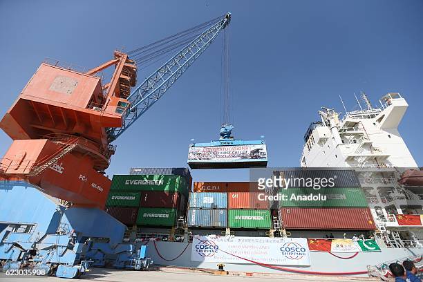 Ship carrying containers are seen during the opening of a trade project in Gwadar port, west of Karachi on November 13, 2016. Pakistani Prime...