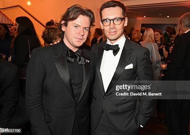 Christopher Kane and Erdem Moralioglu attend a cocktail reception at The 62nd London Evening Standard Theatre Awards, recognising excellence from...