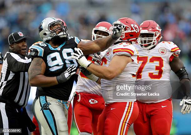 Star Lotulelei of the Carolina Panthers shoves Laurent Duvernay-Tardif of the Kansas City Chiefs after a play in the 4th quarter during their game at...
