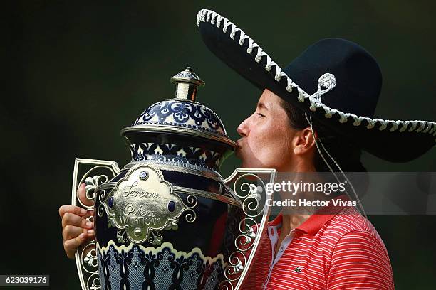 Carlota Ciganda of Spain celebrates with the trophy after winning the Lorena Ochoa Invitational 2016 at Club de Golf on November 13, 2016 in Mexico...