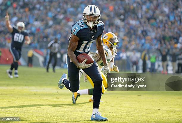 Tajae Sharpe of the Tennessee Titans runs for a touchdown a touchdown during the game against the Green Bay Packers at Nissan Stadium on November 13,...