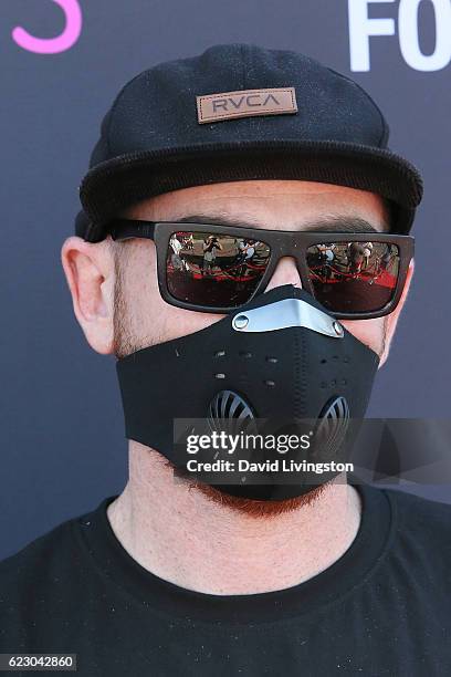 Artist Trav arrives at the P.S. ARTS' Express Yourself 2016 at Barker Hangar on November 13, 2016 in Santa Monica, California.