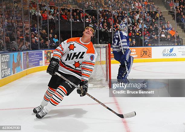 John LeClair grimmaces after missing a shot against J.S. Giguere during the 2016 Hockey Hall of Fame Legends Classic game at the Air Canada Centre on...