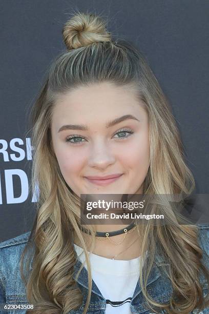 Actress Lizzy Greene arrives at the P.S. ARTS' Express Yourself 2016 at Barker Hangar on November 13, 2016 in Santa Monica, California.