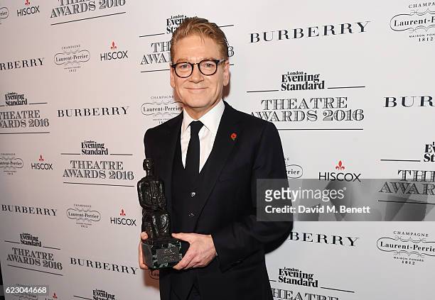 Sir Kenneth Branagh, winner of the Lebedev Award, poses in front of the winners boards at The 62nd London Evening Standard Theatre Awards,...