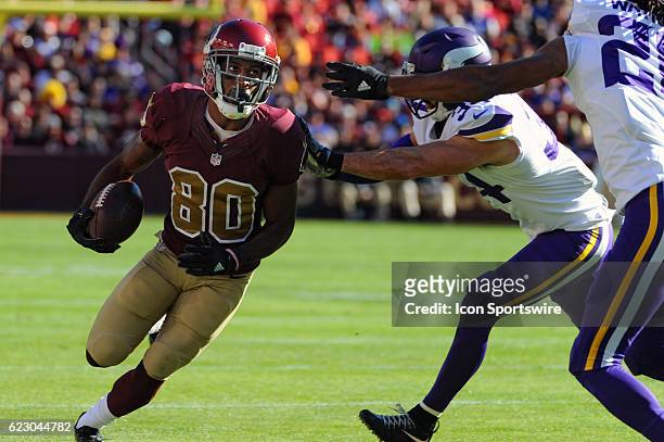 Washington Redskins wide receiver Jamison Crowder catches a pass in the first quarter against Minnesota Vikings strong safety Andrew Sendejo on...